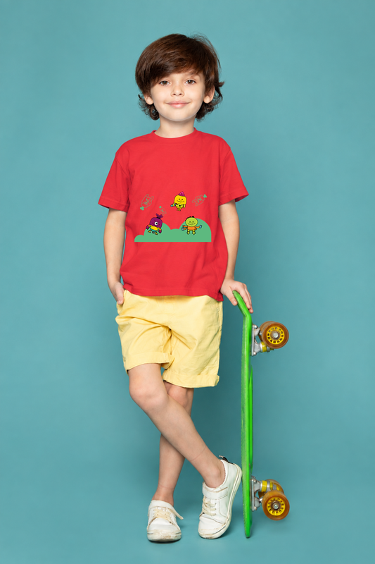 Boy wearing red round-neck kids cotton T-shirt with colourful little characters on green hills print